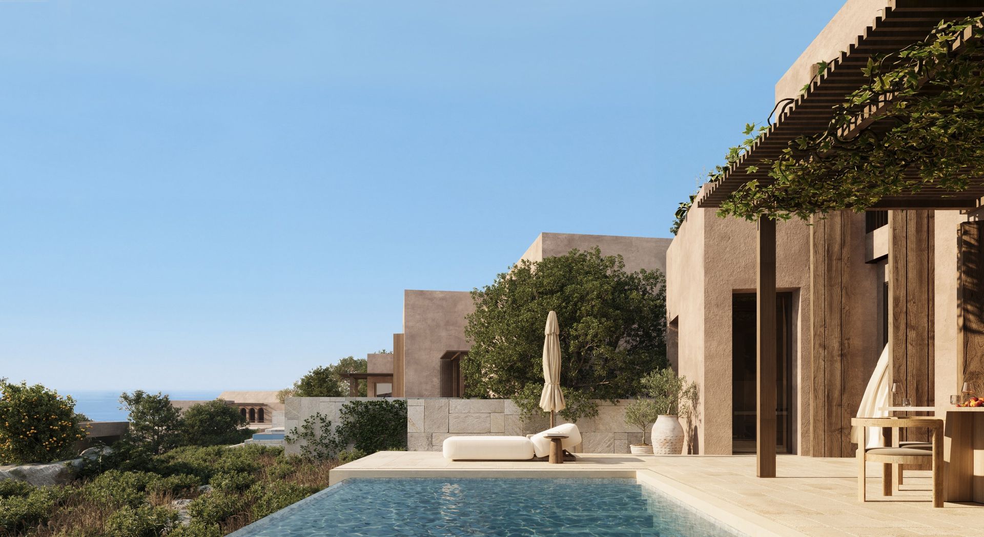 Pool terrace of a boutique villa south under a timber pergola